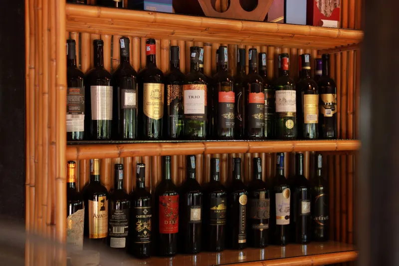 Four Bottles Under $25 That Will Make Your Home Bar Look Like You Actually Know Things
